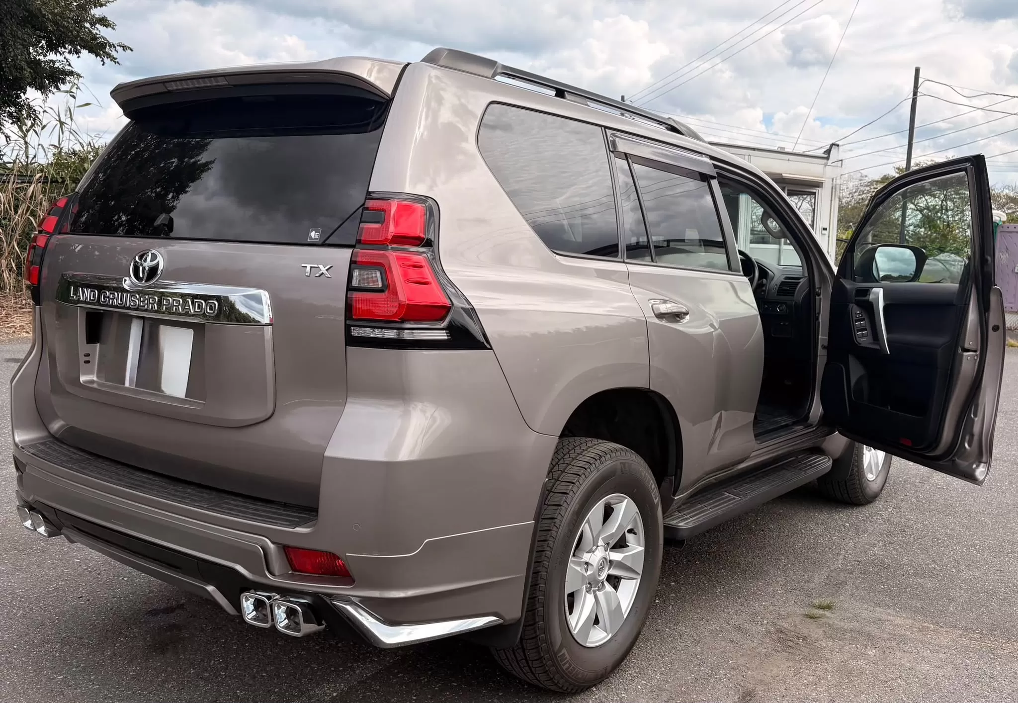 2021 Toyota Land Cruiser Prado TX rear three-quarter view